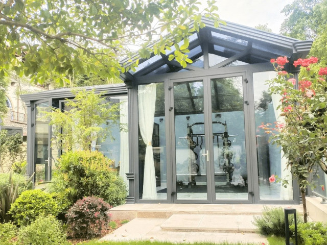Aluminium and glass sunroom extension Melbourne design for a bright, weather-protected living space.